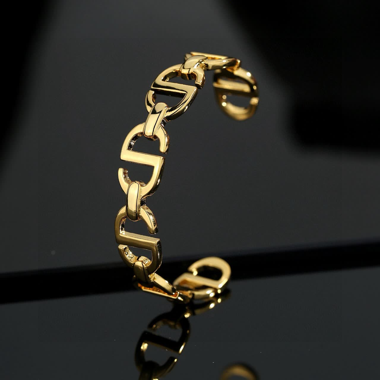 Louis Vuitton Christian Gold Tone Link Bracelet